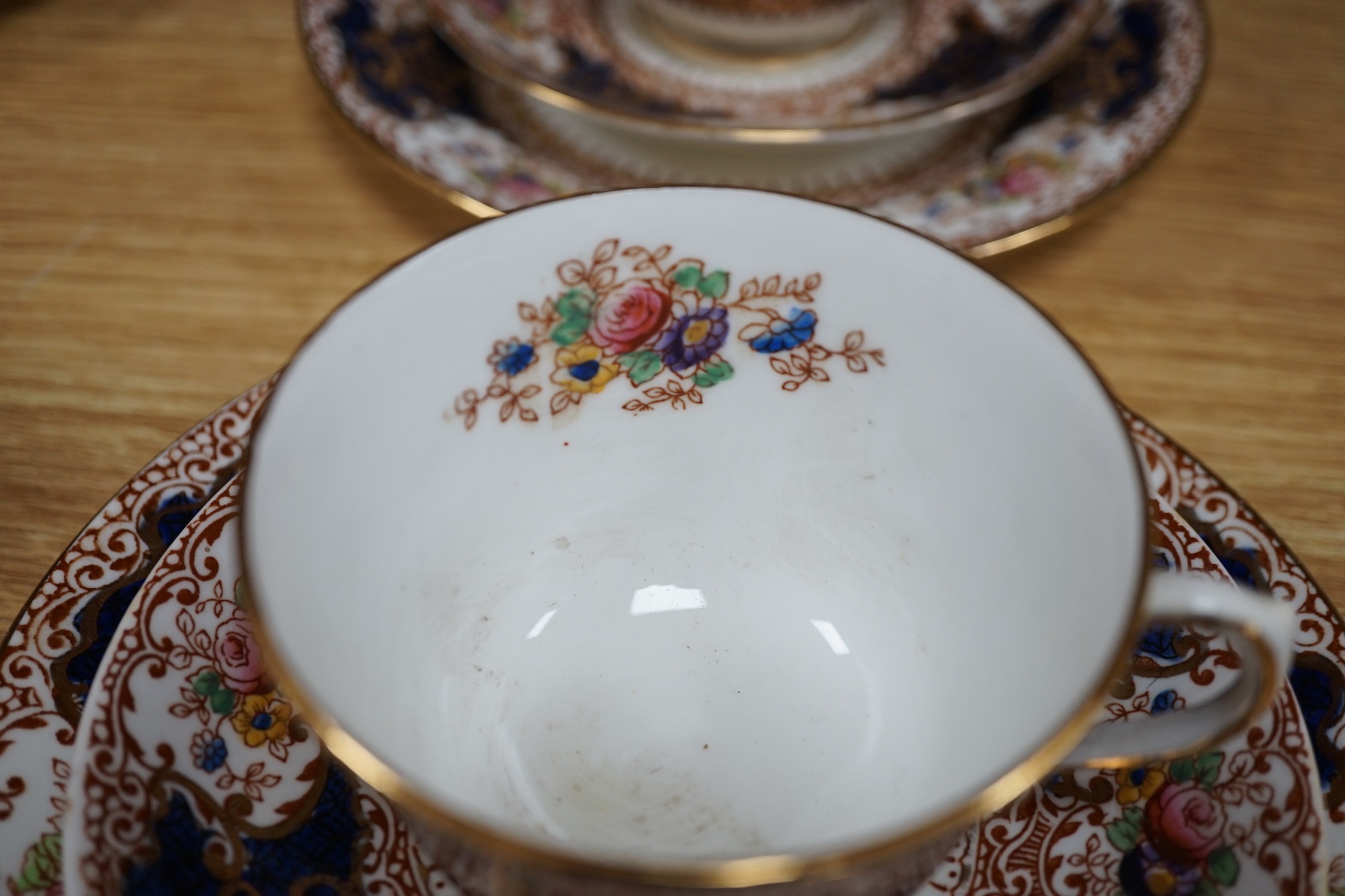 A Crown Staffordshire tea service decorated in white and gilt (46 pieces)